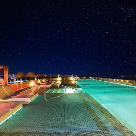 Kensington Jeju Hotel Экстерьер фото Rooftop pool at the hotel